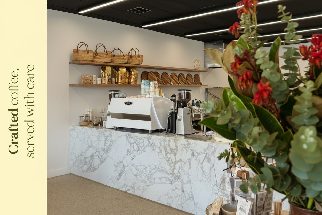 Di Pietros - Coffee shop interior with coffee-making equipment and a decorative sign.
